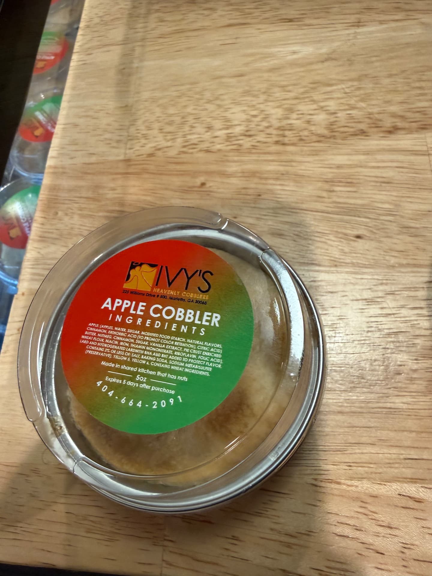 Ivy's apple cobbler 5 oz cup with ingredient label